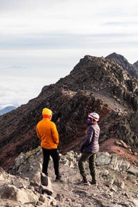 MR_ID30136_21707_FernandoAlanis.jpg, MR_ID30136_21708_DianaRemis.jpg, MR_ID30136_21706_EduardoGavira.jpg A couple of hikers, dressed in outdoor gear, explore a rocky mountain ridge trail. The rugged terrain and stunning mountain views highlight their adventurous spirit Model Released EduardoGavira_ID30136_1016935_014 Copyright: xEduardoxGavirax RECORD DATE NOT STATED