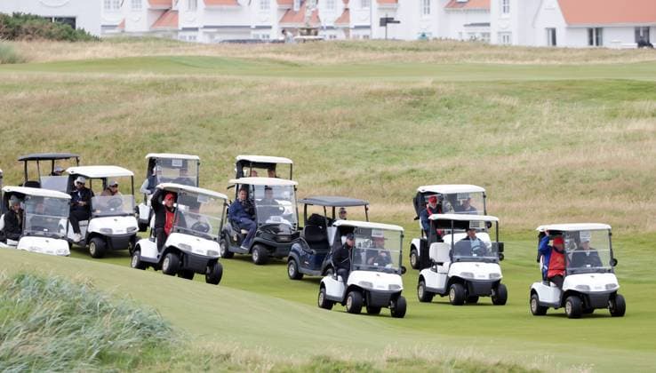 American President Donald Trump drives his golf buggy at Turnberry Golf Club, Ayrshire in Scotland on Sunday, July 27, 2025. Trump is on a four day visit to Scotland where he will be playing golf and meeting International leaders for trade discussions.  LON2025072720 HUGOxPHILPOTT