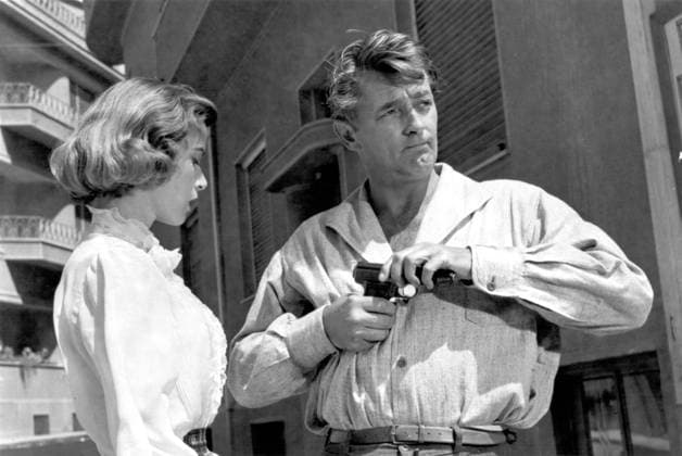 The Angry Hills Movie Stills Jul 15, 1959; Athens, Greece ; Actor ROBERT MITCHUM stars as Mike Morrison and ELISABETH MUELLER as Lisa Kyriakides in the war drama The Angry Hills. Directed by Robert Aldrich. Athens GREECE Copyright: xMGMx