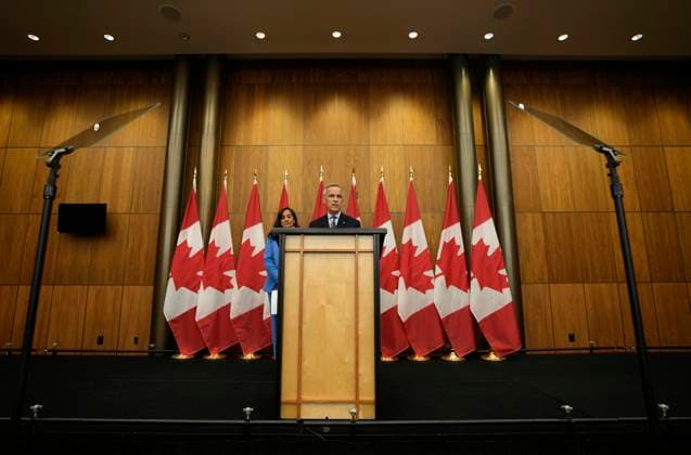 July 30, 2025, Ottawa, On, Canada: Prime Minister Mark Carney speaks with media during a news conference in Ottawa, Wednesday, July 30, 2025. Ottawa Canada  - ZUMAc35_ 20250730_zaf_c35_105 Copyright: xAdrianxWyldx
