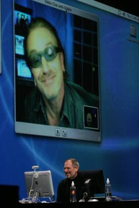 Steve Jobs Announces iTunes for Windows Oct 16, 2003; San Francisco, CA, USA; STEVE JOBS, CEO of Apple Computers, announces both an upgrade for Apple s iTunes application and, for the first time, a Windows version of iTunes and its built-in downloadable Music Store. BONO of the band U2 made an appearance via the screan.. Copyright: xEricxSlomansonx