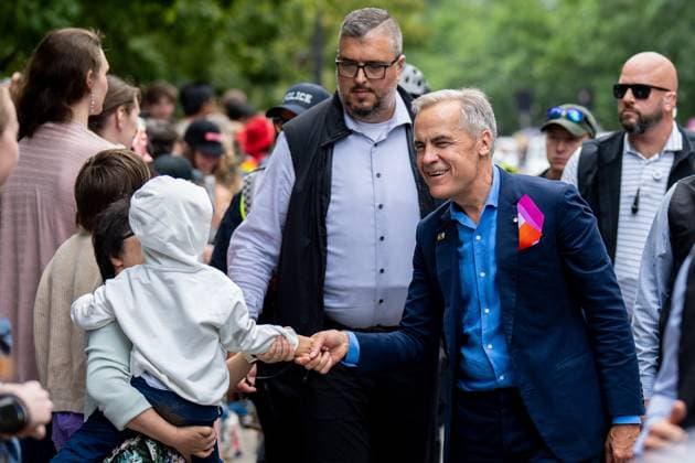 August 3, 2025, Vancouver, Bc, CANADA: Prime Minister Mark Carney greets people during the Vancouver Pride Parade in Vancouver, on Sunday, August 3, 2025. Vancouver CANADA  - ZUMAc35_ 20250803_zaf_c35_214 Copyright: xEthanxCairnsx