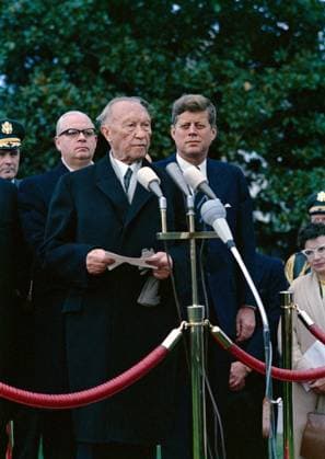 U.S. President John F. Kennedy looking on as Chancellor of West Germany, Dr. Konrad Adenauer, delivers remarks during arrival ceremonies in his honor, South Lawn, White House, Washington, D.C., USA, Robert Knudsen, White House Photographs, November 14, 1962  Copyright: xCircaxImagesx ghi-circa13513