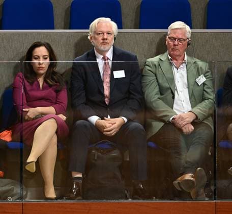 Julian Assange attends at the Council of Europe STRASBOURG, FRANCE - OCTOBER 02: WikiLeaks founder Julian Assange (C), his wife his wife Stella Assange (L) and Kristinn Hrafnsson (R) listen ‘The detention and conviction of Julian Assange and their chilling effects on human rights’ debate at the European council during the Autumn Session of the Parliamentary Assembly of the Council of Europe (PACE) in Strasbourg, France on October 02, 2024. France World. Editorial use only. Please get in touch for any other usage.  Copyright: x2025xAnadoluxMustafaxYalcÄ±nx