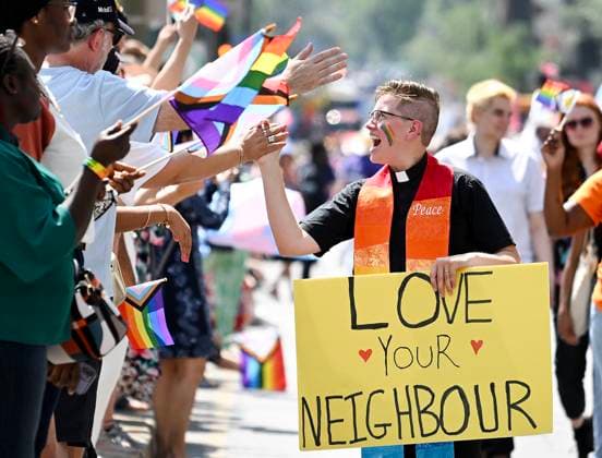 August 10, 2025, Montreal, Pq, Canada: A participant greets members of the crowd during the Pride parade in Montreal, Sunday, August 10, 2025. Montreal Canada  - ZUMAc35_ 20250810_zaf_c35_012 Copyright: xGrahamxHughesx