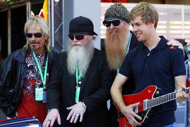 F1 2009 - rd14 Singapore GP - Preparations Sep. 24, 2009 - Singapore - Sebastian Vettel (GER) Red Bull Racing with rock band ZZ Top (L to R): Frank Beard (USA) Drummer; Dusty Hill (USA) ZZ Top bassist; and Billy Gibbons Copyright: xSuttonxMotorsportsx