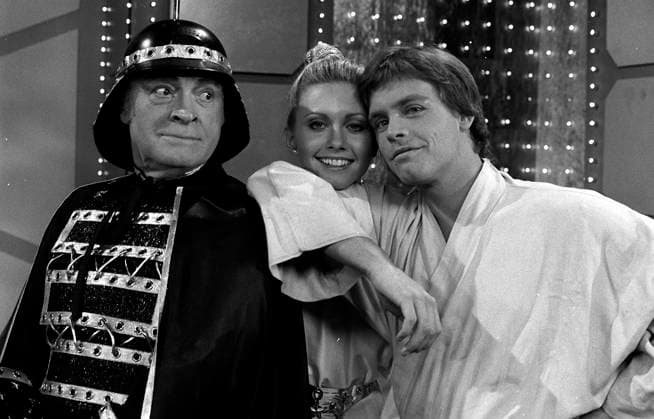 Bob Hope Christmas Special 1977 December 19, 1977, Hollywood, California, USA: (L-R) Actors BOB HOPE, OLIVIA NEWTON JOHN and MARK HAMILL do a spoof on STAR WARS during the NBC Bob Hope 1977 Christmas Special. Copyright: xCourtesyxNBCx