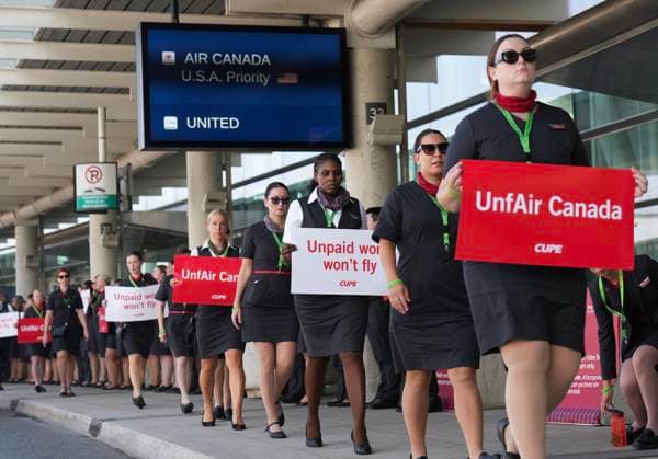 August 11, 2025, Toronto, On, CANADA: Air Canada flight attendants mobilize in preparation for a possible strike at Pearson International Airport in Toronto on Monday, August 11, 2025. Toronto CANADA  - ZUMAc35_ 20250811_zaf_c35_010 Copyright: xNathanxDenettex