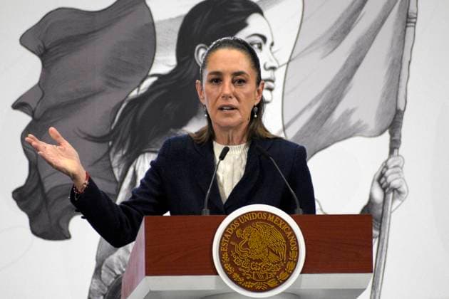 Mexican President Claudia Sheinbaum Pardo, introduces the president of the Presidential Commission for Electoral Reform, Pablo Gomez (not in picture) during a briefing conference, at the National Palace. on August 11, 2025, in Mexico City, Mexico. Mexico City Mexico - ZUMAe321 20250811_zia_e321_003 Copyright: xLuisxBarronx