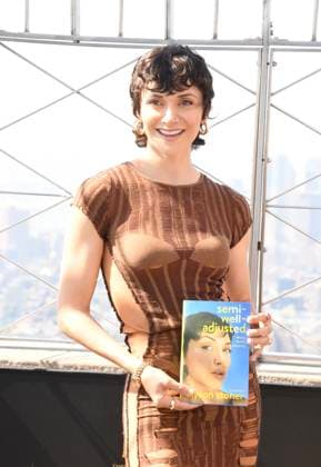 NEW YORK, NY- AUGUST 12: Alyson Stoner visits the Empire State Building to celebrate the release of they them debut memoir, Semi-Well-Adjusted Despite Literally Everything on August 12, 2025 in New York City. Copyright: xMediaPunchx