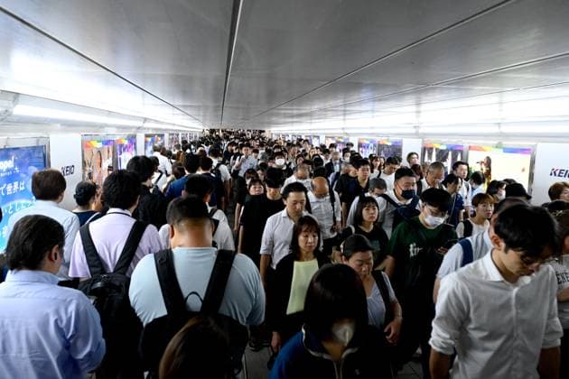 World Population Day in Tokyo TOKYO, JAPAN - JULY 11: People are seen walking in the Shinjuku train station as they going to work on July 11, 2024, in Tokyo, Japan, as the World celebrates the World Population day to raise public awareness of the impact of overpopulation on development, nature and society. The capital of Japan has the title of the most populous city in the world in 2024, with 37,115,00 inhabitants in one of the largest urban agglomerations in the world comprising 23 districts and a metropolitan area of ??Greater Tokyo extending over 3 prefectures, thus housing 25% of the population of Japan. Paradoxically, the population of Japan decreased by 595,000, reaching 124,352,000 inhabitants on October 1, 2023, according to govern  Copyright: x2025xAnadoluxDavidxMareuilx