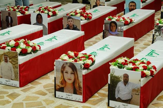 Remains of 22 Yazidis killed by ISIS transferred to their families in Sinjar - 12 Aug 2025 A view of the coffins containing the remains of Yazidis at the forensic medicine department in Mosul, northern Iraq, during the process of transporting them to Sinjar and handing them over to their families. Coffins containing the remains of 22 Yazidis killed in 2014 during the Yazidi genocide by ISIS in Sinjar are returned to their families after being exhumed from a mass grave and identified through DNA testing in Baghdad. This is the eighth group of victims released by the Mosul Forensic Medicine Department. Mosul Iraq Copyright: xIsmaelxAdnanx xSOPAxImagesx IADNAN_03297