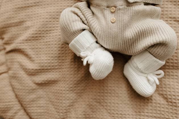 Newborn baby feet in wool booties Cape Town, Western Cape, South Africa R_YNJN250811-1803225-01