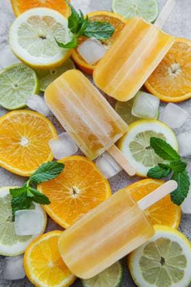 Fruit orange ice popsicle, ice cubes and slices of citrus fruits. Model Released OlenaRudo_ID30879_1046777_030 Copyright: xx