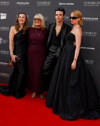 August 12, 2025, London, United Kingdom: Jemima Harrison, YUNGBLUD aka Dominic Richard Harrison and Isobel Harrison attend the YUNGBLUD. Are You Ready, Boy? Premiere at the Vue in Leicester Square. London United Kingdom - ZUMAs197 20250812_aaa_s197_444 Copyright: xCatxMorleyx