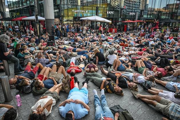 Protest in Utrecht in solidarity with Al Jazeera journalists killed in Gaza UTRECHT, NETHERLANDS - AUGUST 14: Some protesters lie on the ground in front of the Utrecht Central Station to show solidarity with Al Jazeera journalists killed in Gaza, including Anas al-Sharif, in Utrecht, Netherlands on August 14, 2025. The demonstration began at Utrecht Central Station and continued with a march through the city’s streets. The protest included a Die-In to honor those killed in Gaza, and participants held up photos of the journalists who lost their lives there. Protesters chanted against Israel and the Dutch government, criticizing its unwavering support for Israel, in contrast to Germany, France, and other European countries that have taken s  Copyright: x2025xAnadoluxMounebxTaimx