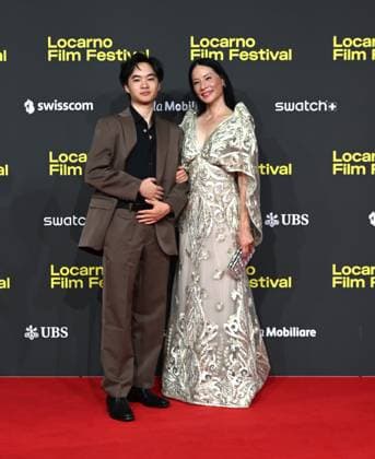 Locarno,Swiss Locarno Film Festival 2025 Photocall and red carper present Rosemead film Piazza Grande In the photo:Lucy Liu actress producer dress Naeem Khan, Lawrence Shou actor  Copyright: xNickxZonnax xipa-agency.netx xNickxZonnax IPA_Agency_IPA62448001