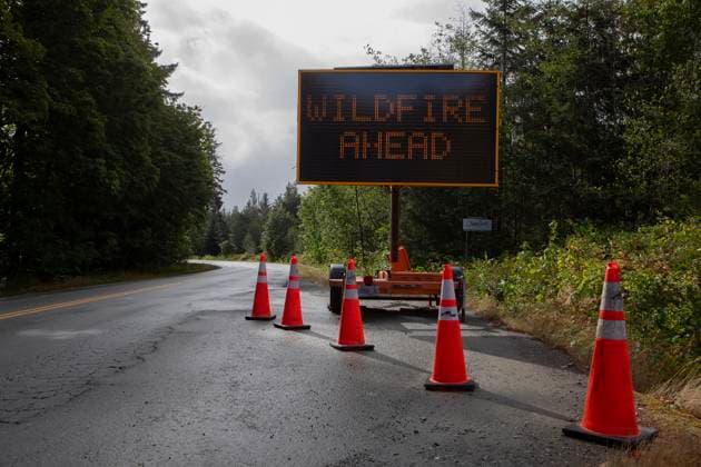 August 16, 2025, Port Alberni, Bc, CAN: Wildfire signage heading towards Bamfield Main due to the Underwood Mountain wildfire south of Port Alberni, B.C., on Saturday, August 16, 2025. Port Alberni CAN  - ZUMAc35_ 20250816_zaf_c35_139 Copyright: xChadxHipolitox
