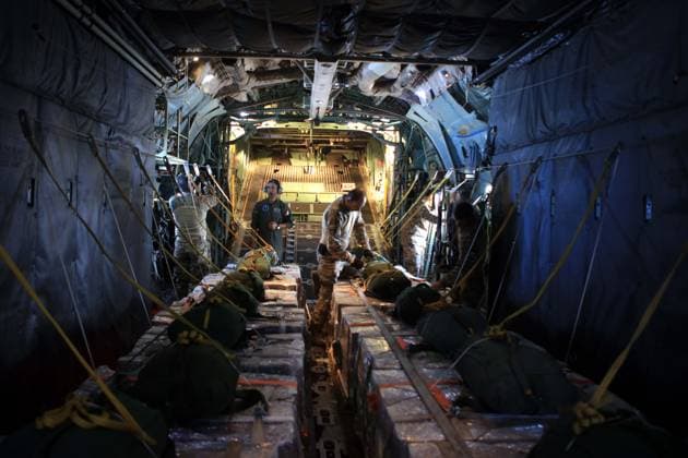 (250817) -- ZARAQ, Aug. 17, 2025 -- Relief supplies for airdropping to Gaza are seen inside a plane from the Royal Jordanian Air Force, on Aug. 17, 2025. Jordan on Sunday carried out a new airdrop of relief supplies into the Gaza Strip. About 106 tonnes of food and relief supplies were dropped during the operation. (Photo by Xinhua) JORDAN-AIRDROP-RELIEF SUPPLIES-GAZA MohammadxAbuxGhosh 
