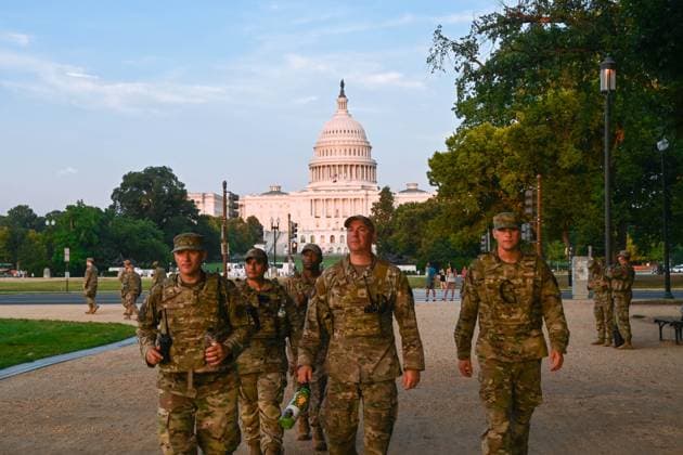 August 16, 2025, Washington, Dc, United States: U.S. Army National Guard soldiers assigned to the D.C. Safe and Beautiful Task Force patrol along the National Mall with the U.S Capitol building behind, August 16, 2025 in Washington, D.C. U.S President Donald Trump deployed approximately 800 National Guard service members under the false premise of a crime wave in the capital. Washington United States - ZUMAp138 20250816_zaa_p138_021 Copyright: xSsgt.xNataliexFilzen U.SxArmyx