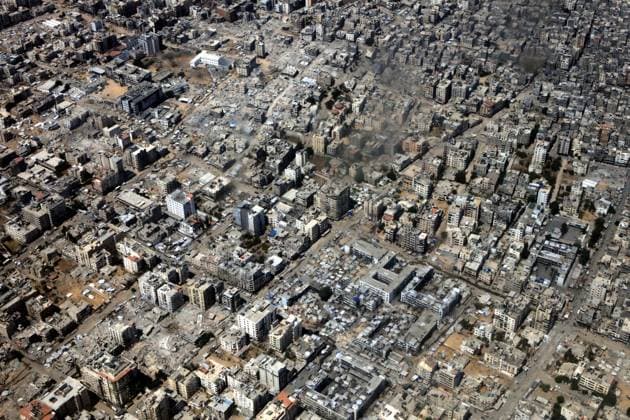 (250818) -- BEIJING, Aug. 18, 2025 -- This photo taken from a Royal Jordanian Air Force airplane shows a view of the Gaza Strip on Aug. 17, 2025. Jordan on Sunday carried out a new airdrop of relief supplies into the Gaza Strip. (Photo by Xinhua) XINHUA PHOTOS OF THE DAY MohammadxAbuxGhosh 