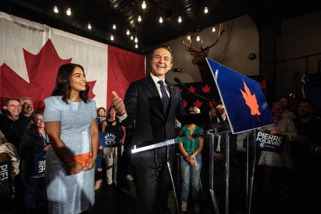 August 18, 2025, Camrose, Ab, CANADA: Anaida Poilievre and Conservative Party Leader Pierre Poilievre celebrate the win during the Battle River-Crowfoot byelection in Camrose, Alta., Monday, Aug. 18, 2025. Camrose CANADA  - ZUMAc35_ 20250818_zaf_c35_123 Copyright: xJasonxFransonx