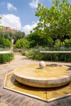Beautiful Fountain in The Secret Garden Surrounded by Lush Greenery in Marrakech Beautiful Fountain in The Secret Garden Surrounded by Lush Greenery in Marrakech, Morroco, 63234350.jpg RECORD DATE NOT STATED
