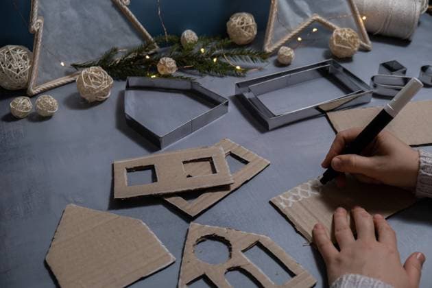 Cardboard House Gift Christmas idea. Do it yourself instruction eco-friendly decoration. Zero waste Making handmade presents children s diy projects. Holiday family time Cardboard House Gift Christmas idea. Do it yourself instruction eco-friendly decoration. Zero waste Making handmade presents children s diy projects. Holiday family time. Creative activity, 63328024.jpg RECORD DATE NOT STATED