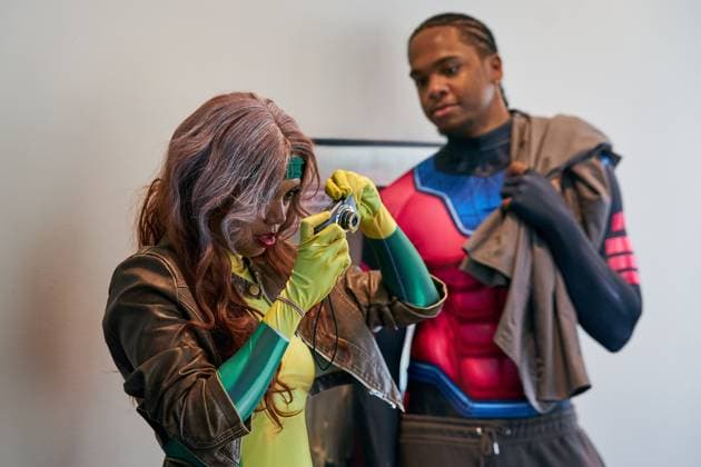 August 22, 2025, Toronto, On, Canada: Convention-goers in cosplay take photos on the second day of the annual Fan Expo convention in Toronto, on Friday, Aug. 22, 2025. Toronto Canada  - ZUMAc35_ 20250822_zaf_c35_139 Copyright: xSammyxKoganx