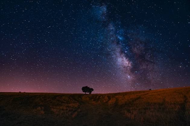 Milky Way stretches across the night sky in Ankara ANKARA, TURKIYE - AUGUST 23: A view shows the Milky Way galaxy shining brightly above a lone tree in a field, captured with long-exposure photography in Ankara, Turkiye, on August 23, 2025. Ercin Erturk Anadolu Ankara Turkey. Editorial use only. Please get in touch for any other usage.  Copyright: x2025xAnadoluxErcinxErturkx