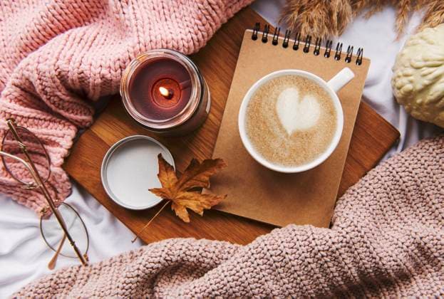 Autumn still life with pumpkins, coffee and burning candles. Cozy fall composition Model Released OlenaRudo_ID31111_1055400_029 Copyright: xx