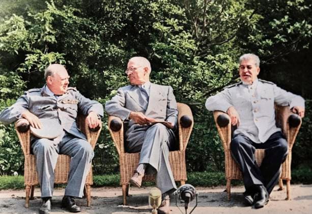 Potsdam, Germany. Participants of the Potsdam Conference, leaders of the countries of the anti-Hitler coalition in the Second World War Prime Minister of the United Kingdom Sir Winston Churchill, President of the United States Harry Truman and Chairman of the Council of People s Commissars of the USSR, Chairman of the State Defense Committee of the USSR and Secretary of the All-Union Communist Party (Bolsheviks) Joseph Stalin (L-R) attend a press conference. AI-Colourised from original ID 32389955. Yevgeny Khaldei TASS  82806195