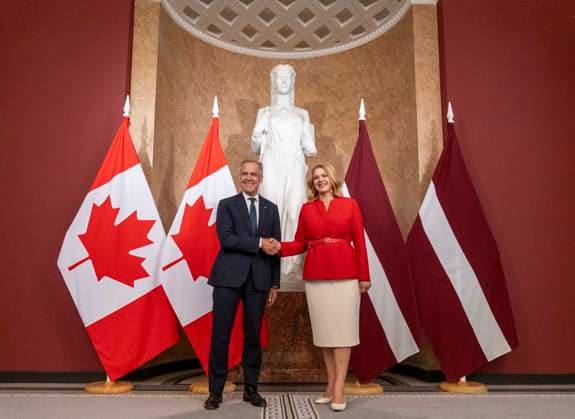 August 26, 2025, Riga, LATVIA: Prime Minister Mark Carney shakes hands as he meets with Latvian Prime Minister Evika Silina at the Cabinet of Ministers in Riga, Latvia on Tuesday, Aug. 26, 2025. Riga LATVIA  - ZUMAc35_ 20250826_zaf_c35_049 Copyright: xChristinnexMuschix