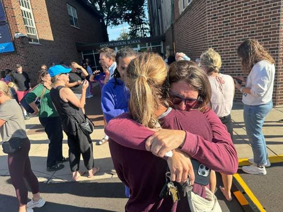 August 27, 2025, Minneapolis, Minnesota, USA: Parents await news of their children after a shooting near Annunciation Church in Minneapolis on Wednesday morning. Two young children were killed and 17 others were injured in the mass shooting at the Church. The gunman fired a rifle through the church windows towards children and worshippers. An 8-year-old and a 10-year-old were killed while they sat in the pews. Of the 17 others injured, 14 are children. Two of them are in critical condition. The gunman was in his 20s, and ultimately died of a self-inflicted gunshot wound. Minneapolis USA - ZUMAm67_ 20250827_zaf_m67_004 Copyright: xRichardxTsong-Taatariix