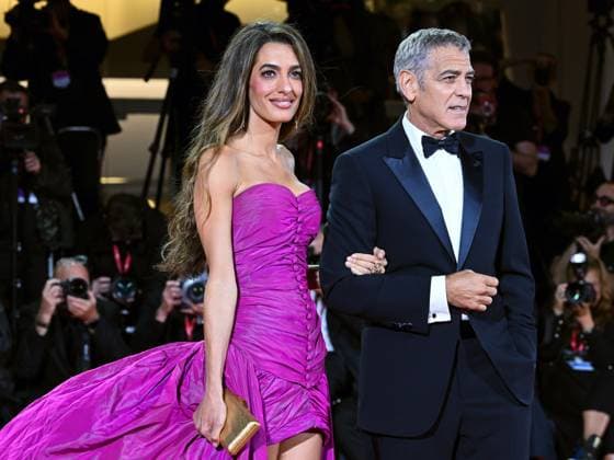 Venice, ITALY: Venice, 82nd Venice International Film Festival 2025 - Evening 2 - Red Carpet for the film Jay Kelly - Pictured: George and Amal Clooney Venice ITALY  - ZUMAp169 20250828_zea_p169_1809 Copyright: xManuelexMangiarottix