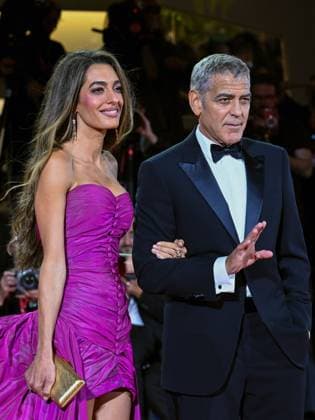 Venice, ITALY: Venice, 82nd Venice International Film Festival 2025 - Evening 2 - Red Carpet for the film Jay Kelly - Pictured: George and Amal Clooney Venice ITALY  - ZUMAp169 20250828_zea_p169_1812 Copyright: xManuelexMangiarottix