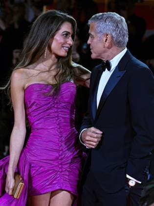 Venice, ITALY: Venice, 82nd Venice International Film Festival 2025 - Evening 2 - Red Carpet for the film Jay Kelly - Pictured: George and Amal Clooney Venice ITALY  - ZUMAp169 20250828_zea_p169_1813 Copyright: xManuelexMangiarottix