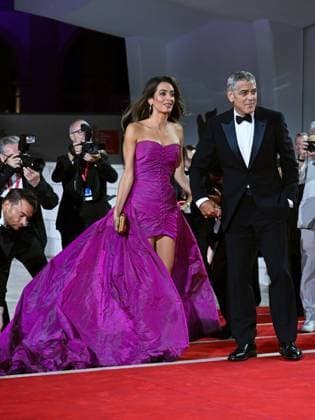 Venice, ITALY: Venice, 82nd Venice International Film Festival 2025 - Evening 2 - Red Carpet for the film Jay Kelly - Pictured: George and Amal Clooney Venice ITALY  - ZUMAp169 20250828_zea_p169_1806 Copyright: xManuelexMangiarottix