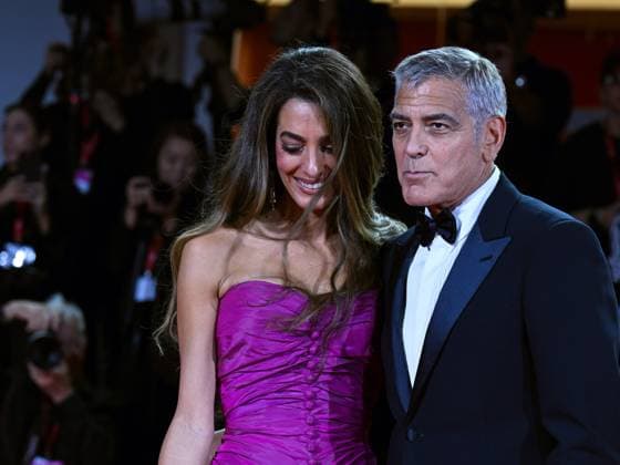 Venice, ITALY: Venice, 82nd Venice International Film Festival 2025 - Evening 2 - Red Carpet for the film Jay Kelly - Pictured: George and Amal Clooney Venice ITALY  - ZUMAp169 20250828_zea_p169_1775 Copyright: xManuelexMangiarottix