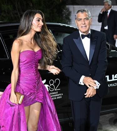 American actor George Clooney and British lawyer Amal Clooney attend the premiere of Jay Kelly at the 82nd Venice Film Festival in Venice, Italy on Thursday, August 28, 2025.  VEN202508281101 RUNExHELLESTAD