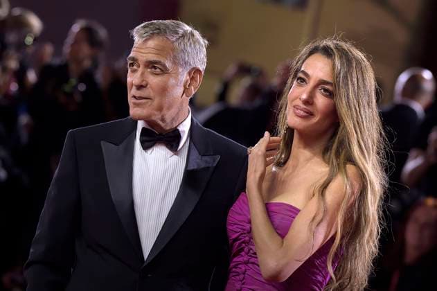 Amal Clooney and George Clooney attend the Jay Kelly red carpet during the 82nd Venice International Film Festival on Thursday, August 28, 2025 in Venice, Italy.  VEN20250828216 RoccoxSpaziani