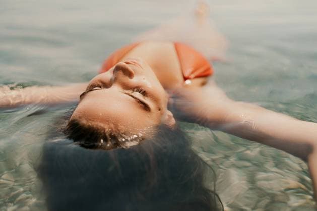 Happy woman sea relaxing floating in transparent sea water on summer holiday. Travel leisure recreation lifestyle, female in nature. Happy woman sea relaxing floating in transparent sea water on summer holiday. Travel leisure recreation lifestyle, female in nature, model released, , 63305716.jpg RECORD DATE NOT STATED
