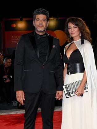 Venice, ITALY: Venice, 82nd Venice International Film Festival 2025 - Evening 3 - Red Carpet for the film Calle Malaga - Pictured: Nabil Ayouch and Maryam Touzani Venice ITALY  - ZUMAp169 20250829_zea_p169_1388 Copyright: xAlbertoxTerenghix