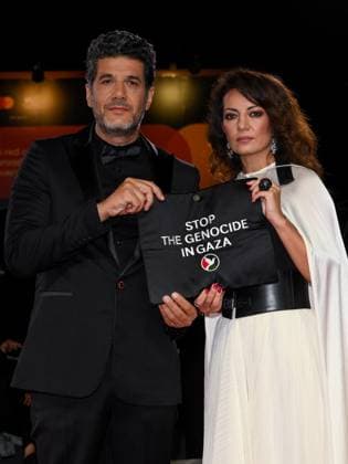 Venice, ITALY: Venice, 82nd Venice International Film Festival 2025 - Evening 3 - Red Carpet for the film Calle Malaga - Pictured: Nabil Ayouch and Maryam Touzani Venice ITALY  - ZUMAp169 20250829_zea_p169_1394 Copyright: xAlbertoxTerenghix