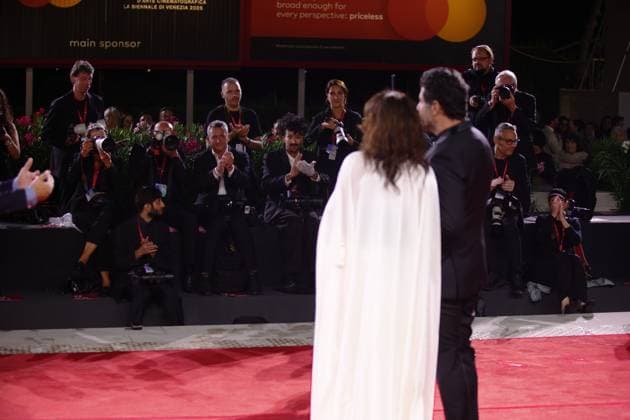 82nd Venice Film Festival - Eojjeol suga eopda (No Other Choice) VENICE, ITALY - AUGUST 29: Photographers applaud the pro-Palestine sign displayed by director Maryam Touzani and producer Nabil Ayouch at the red carpet of the film Eojjeol suga eopda (No Other Choice) at the 82nd Venice Film Festival in Venice, Italy on August 29th, 2025. Marco Barada Anadolu Venice Italy. Editorial use only. Please get in touch for any other usage.  Copyright: x2025xAnadoluxMarcoxBaradax