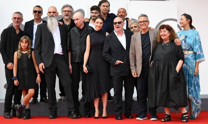 August 30, 2025, Venice, ITALY: Italian director Gianfranco Rosi (C) poses with the cast as he arrives for the premiere of Sotto le Nuvole during the 82nd Venice Film Festival in Venice, Italy, 30 August 2025. The movie is presented in official competition Venezia 82 at the festival running from 27 August to 06 September 2025. ANSA ETTORE FERRARI. Venice ITALY  - ZUMAa110 20250830_zaf_a110_044 Copyright: xEttorexFerrarix