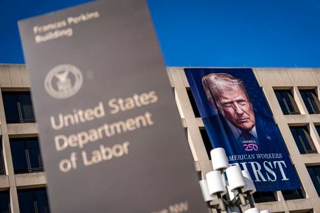 A portrait of President Donald Trump is draped on the front of the Department of Labor Headquarters in Washington, DC on Saturday, August 30, 2025. The banner, displayed next to a portrait of Teddy Roosevelt, features Trump s second inaugural portrait, the logo for his America 250 initiative, and the words American Workers First.  WAP20250830326 BONNIExCASH