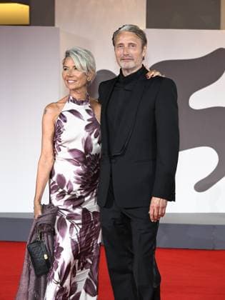 Venice, Italy: Venice, 82nd Venice International Film Festival 2025 - Evening 4 - Red Carpet for the film The Last Viking . Pictured: Mads Mikkelsen with his wife Hanne Jacobsen. Venice Italy  - ZUMAp169 20250830_zea_p169_1856 Copyright: xSimonexComix