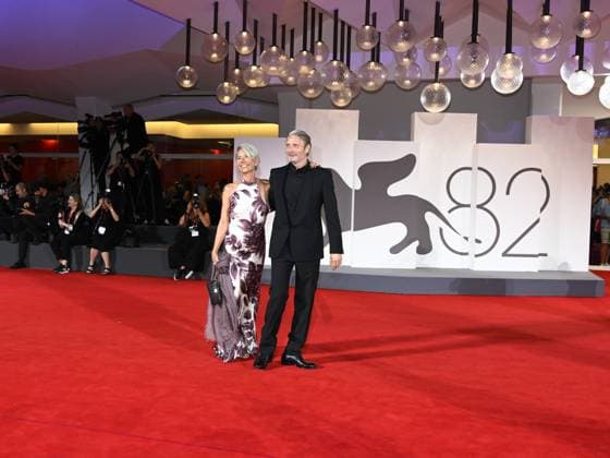 Venice, Italy: Venice, 82nd Venice International Film Festival 2025 - Evening 4 - Red Carpet for the film The Last Viking . Pictured: Mads Mikkelsen with his wife Hanne Jacobsen. Venice Italy  - ZUMAp169 20250830_zea_p169_1858 Copyright: xSimonexComix