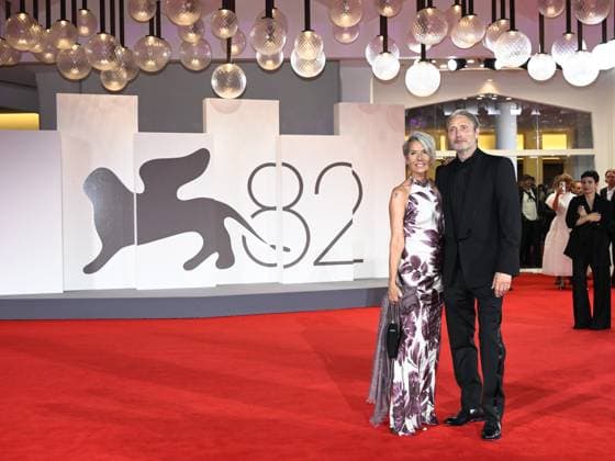 Venice, Italy: Venice, 82nd Venice International Film Festival 2025 - Evening 4 - Red Carpet for the film The Last Viking . Pictured: Mads Mikkelsen with his wife Hanne Jacobsen. Venice Italy  - ZUMAp169 20250830_zea_p169_1859 Copyright: xSimonexComix